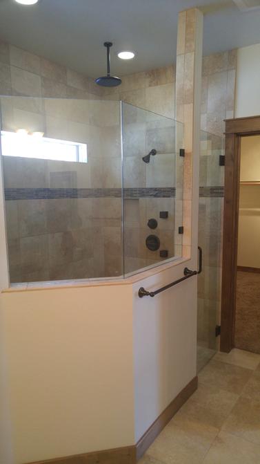 custom glass shower wall and door bronze